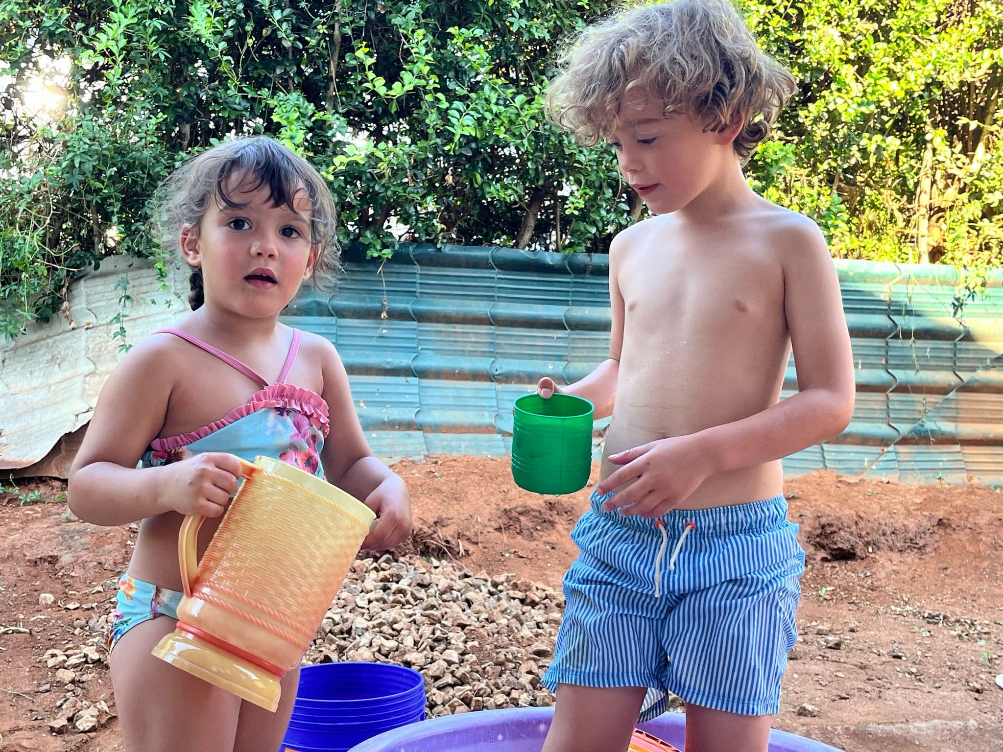 Kids playing wiht water