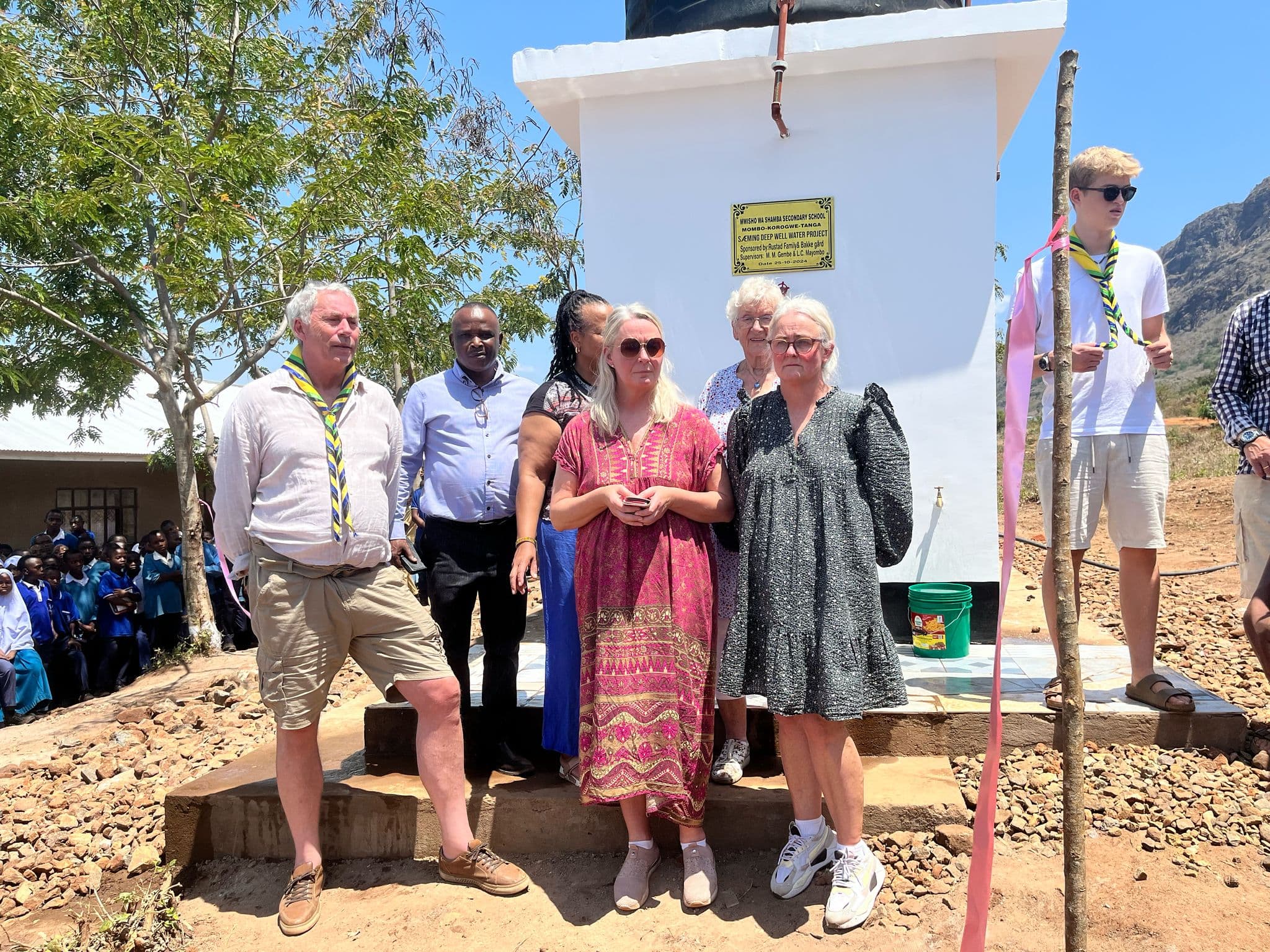 Opening the community water tank