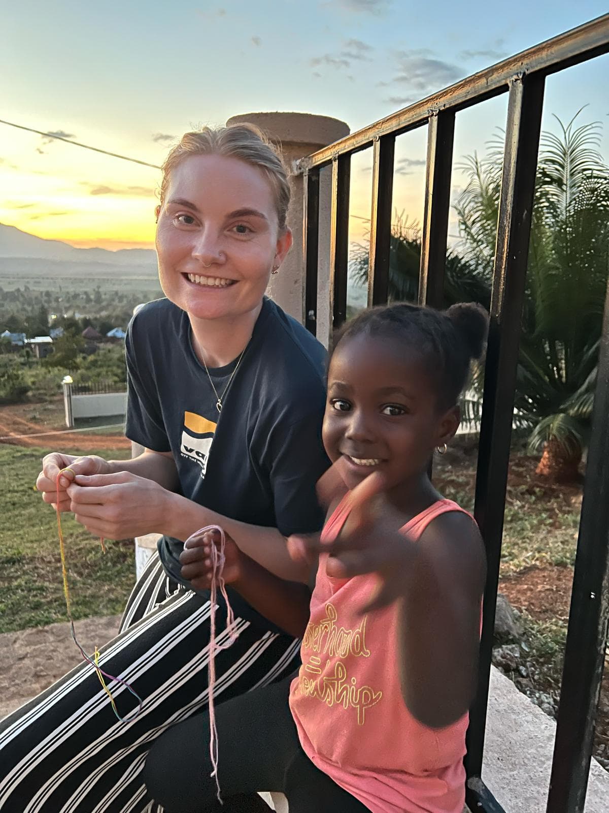 A lady and kid sharing hadworks